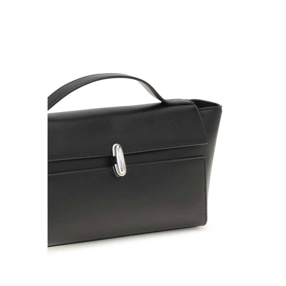 Savette Clutch aus Kalbsleder Bos Taurus in Schwarz