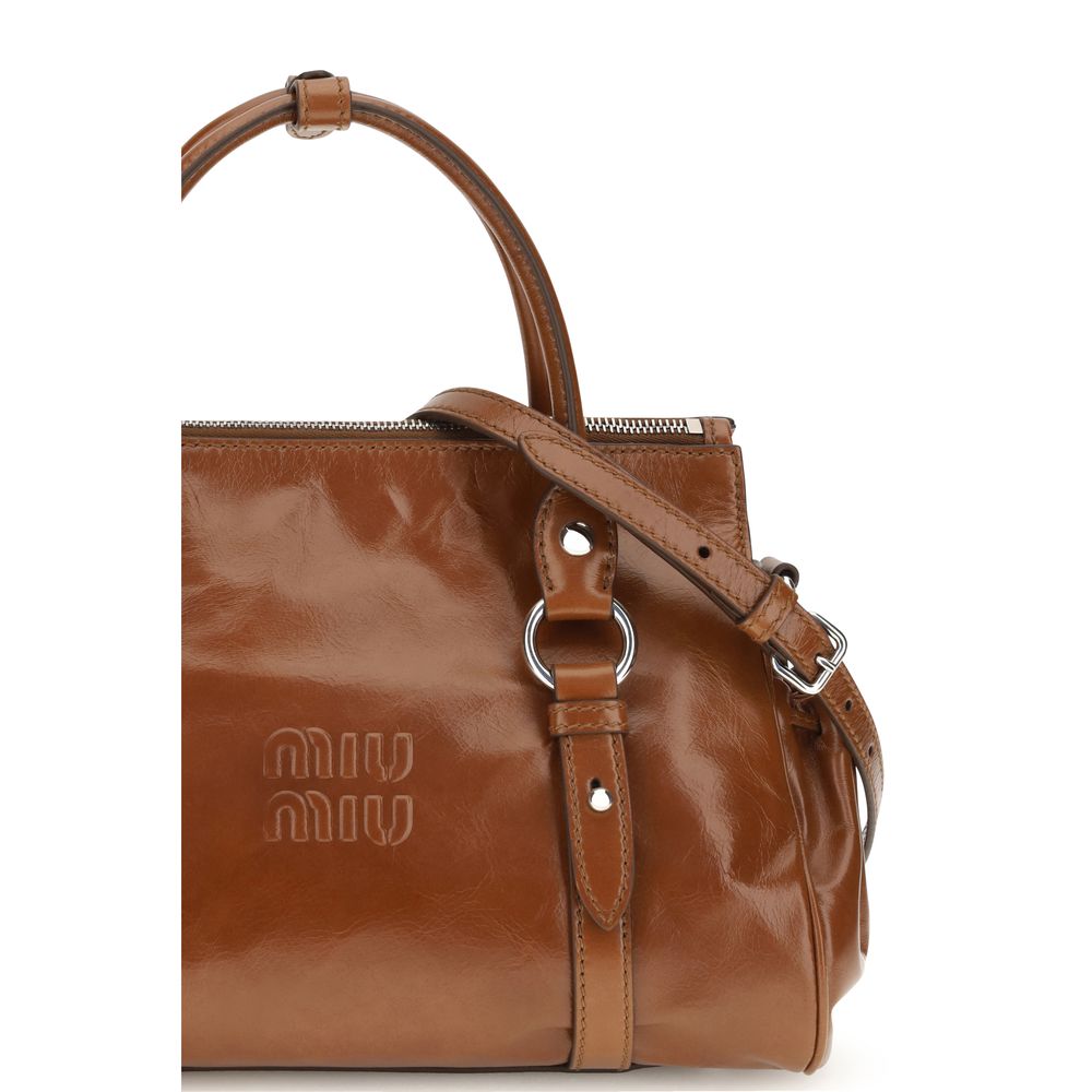 Miu Miu braune Kalbsleder-Handtasche Bos Taurus