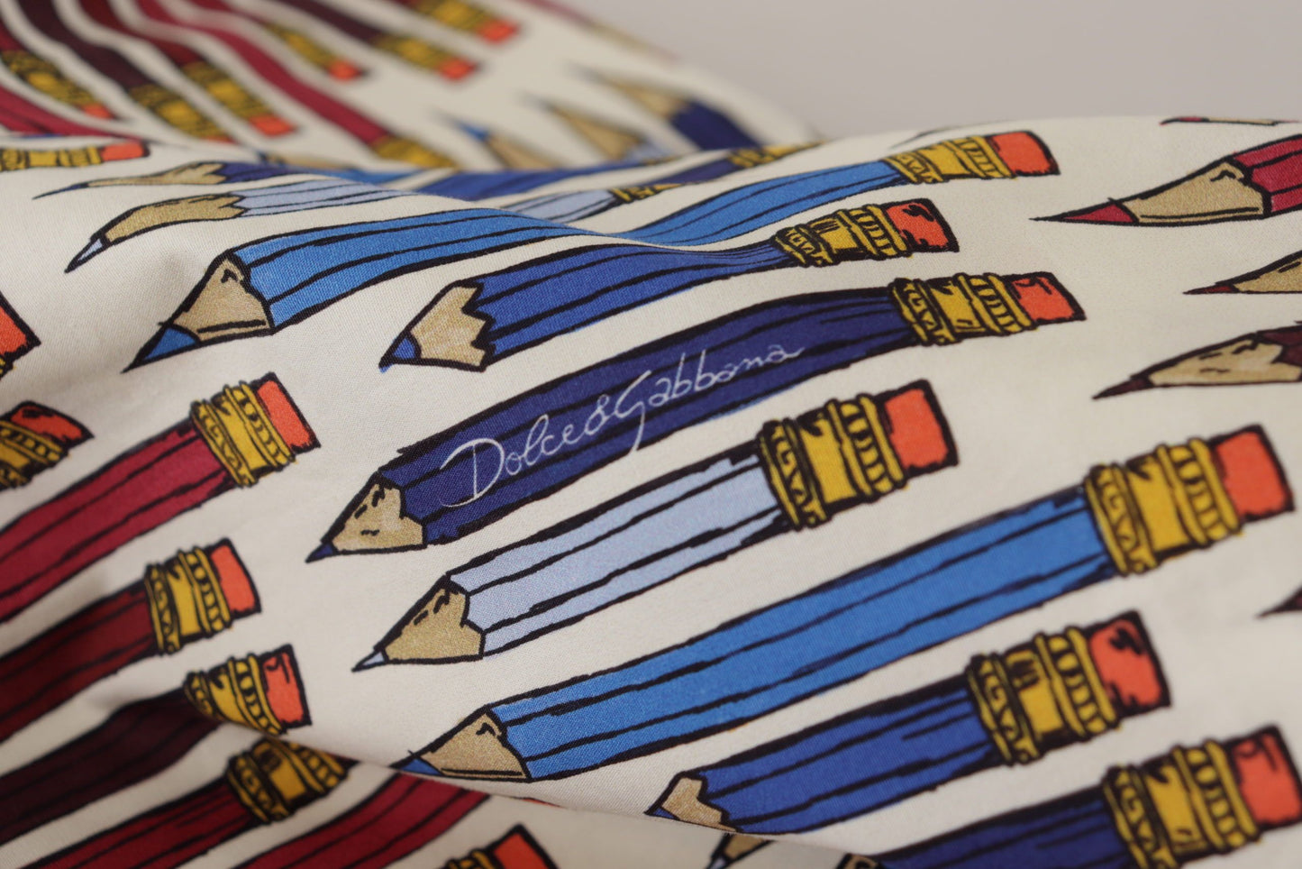 Dolce & Gabbana – Weiße T-Shirt-Bluse aus Baumwolle mit Bleistiftdruck