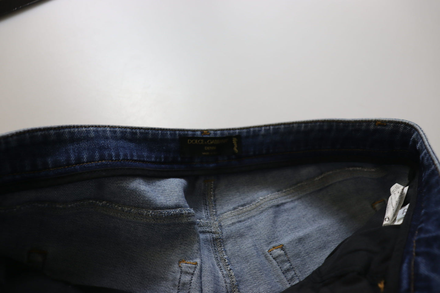Dolce & Gabbana – Skinny-Jeans aus gewaschener Baumwolle mit niedriger Taille in Blau