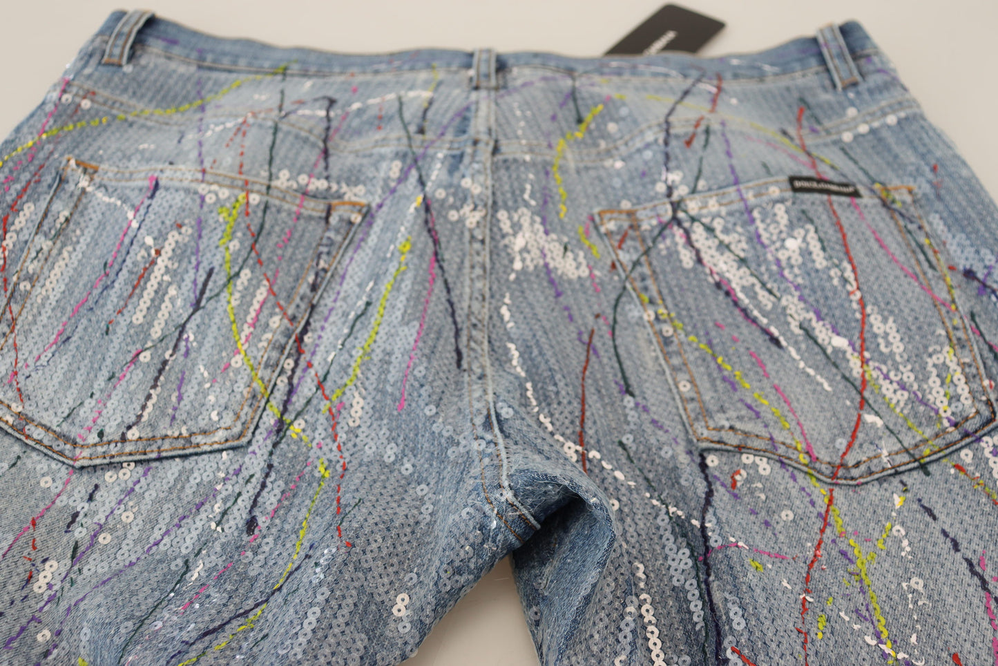 Dolce & Gabbana – Blaue Jeans aus Baumwoll-Denim mit Farbspritzer-Print