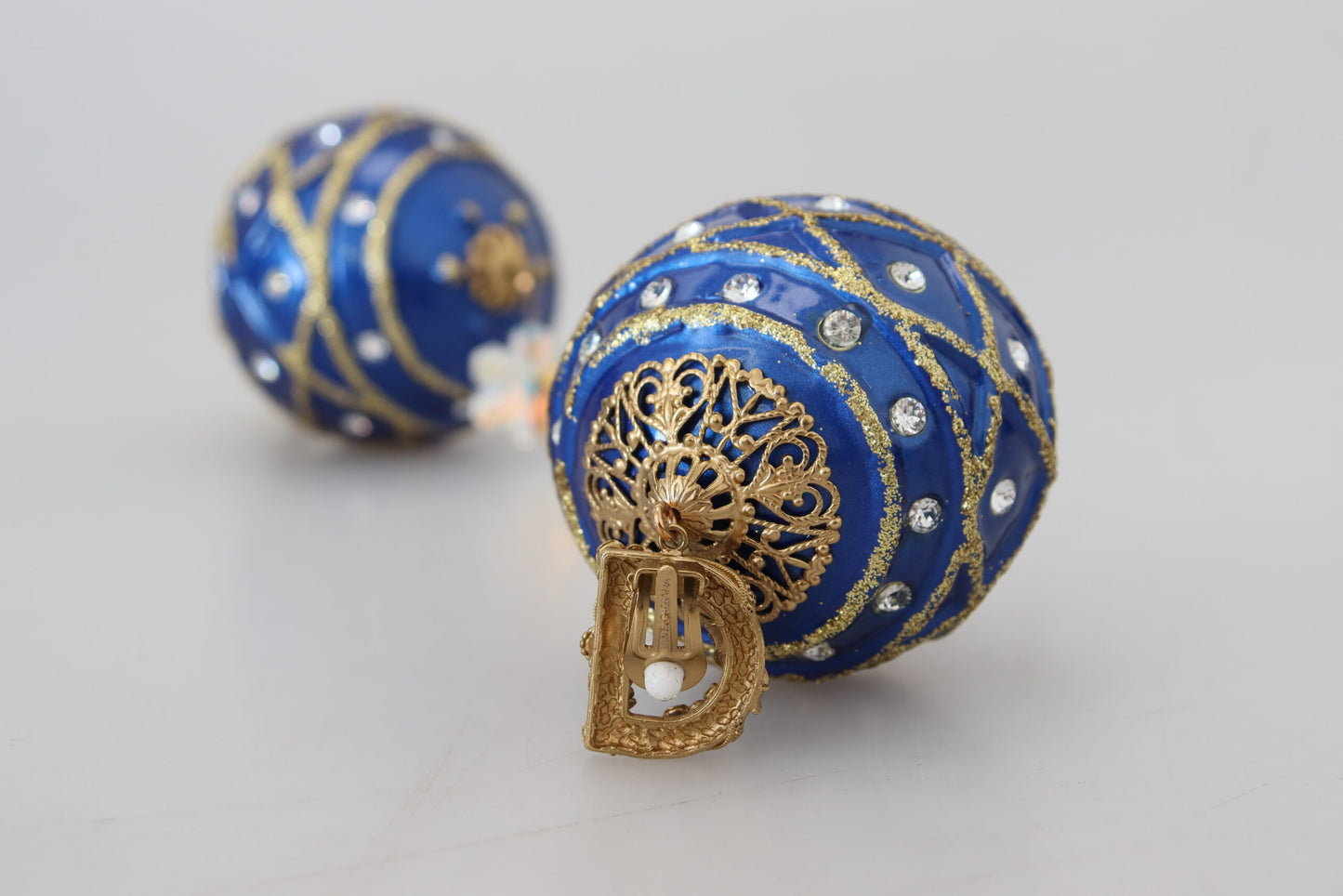 Dolce & Gabbana – Ohrclips aus goldenem Messing mit blauen Kugeln und Kristallen