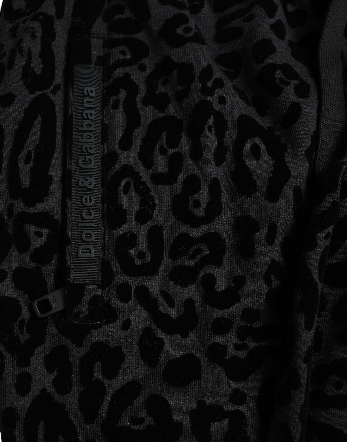 Dolce & Gabbana – Schwarze Jogginghose aus Baumwolle mit Leopardenmuster und schmaler Passform