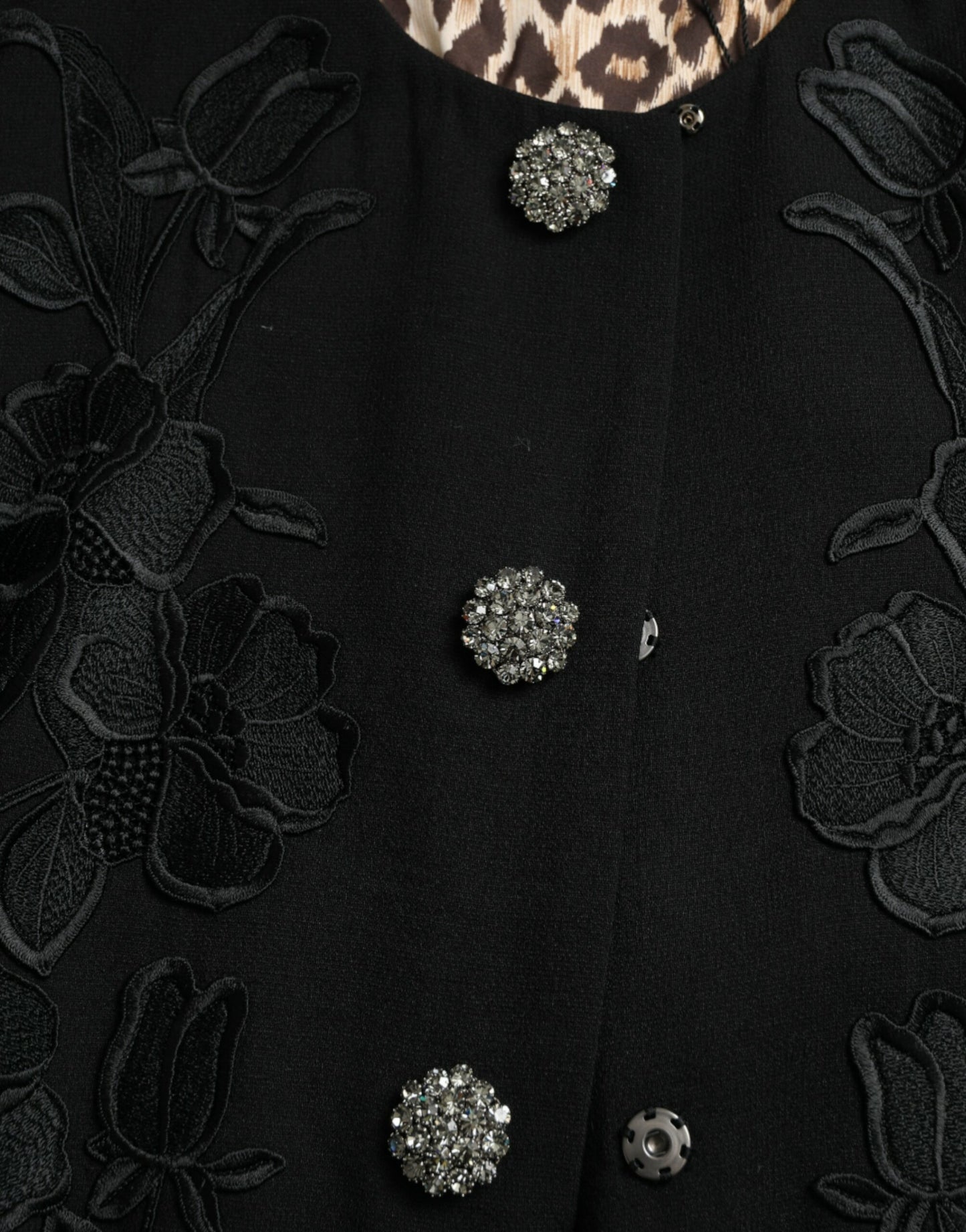 Dolce & Gabbana – Schwarze Wolljacke mit Blumenmuster und Knopfverzierung