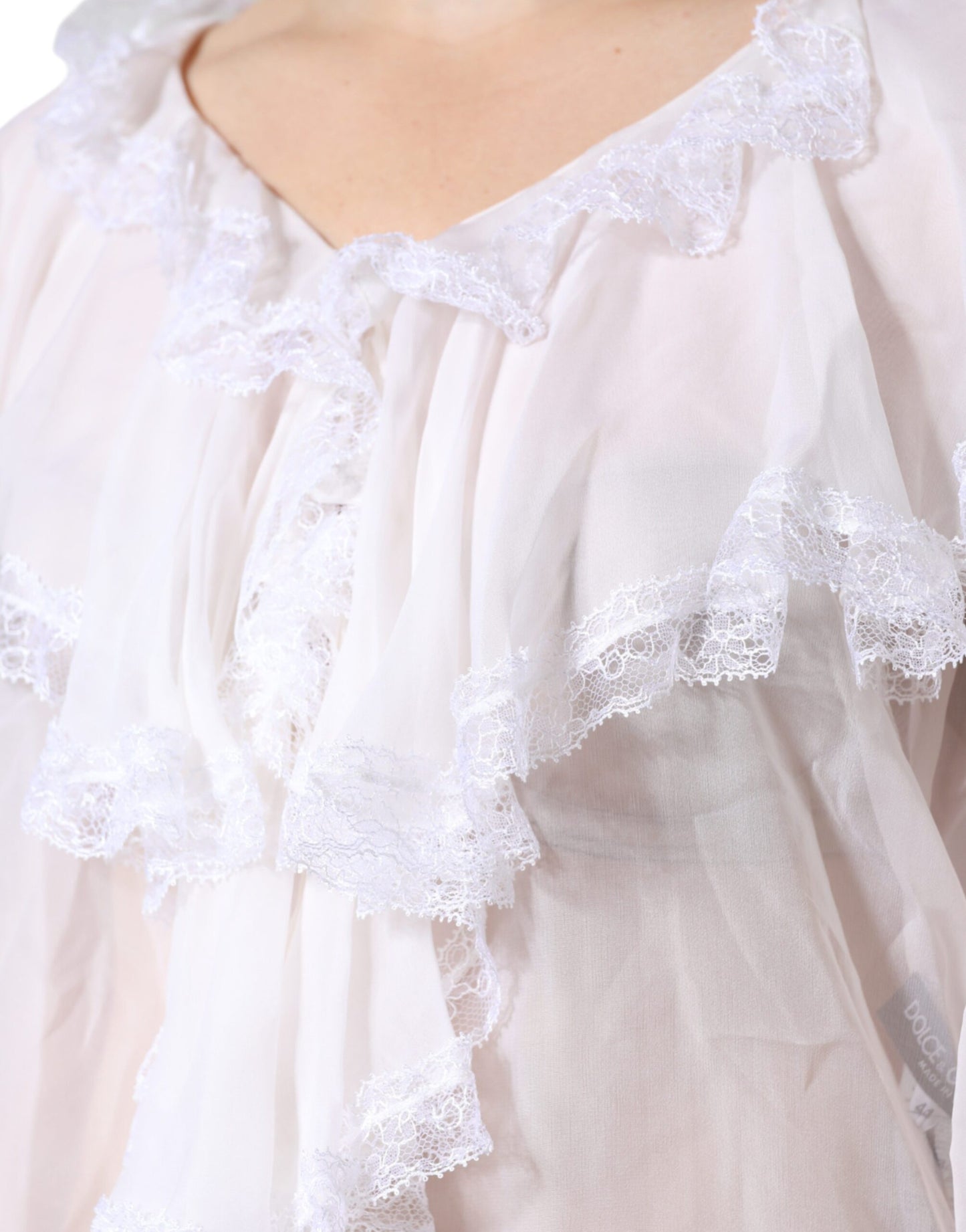 Dolce & Gabbana – Langärmliges Blusenoberteil mit Rüschen und Spitze in Weiß