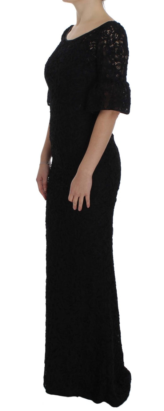 Dolce & Gabbana – Langes, figurbetontes Maxikleid aus geblümter Spitze in Schwarz