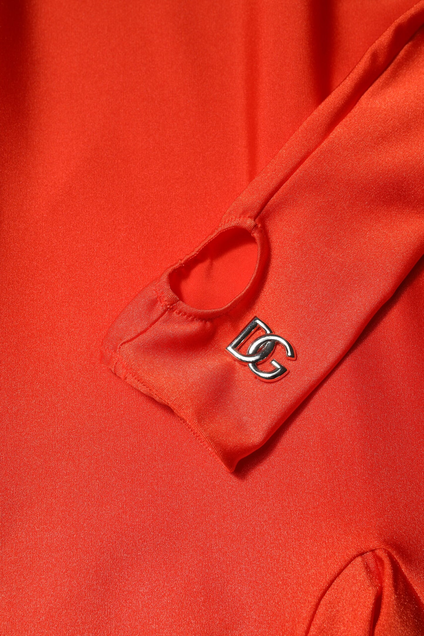 Dolce & Gabbana, rotes, figurbetontes Jumpsuit-Kleid aus Nylon mit Rollkragen