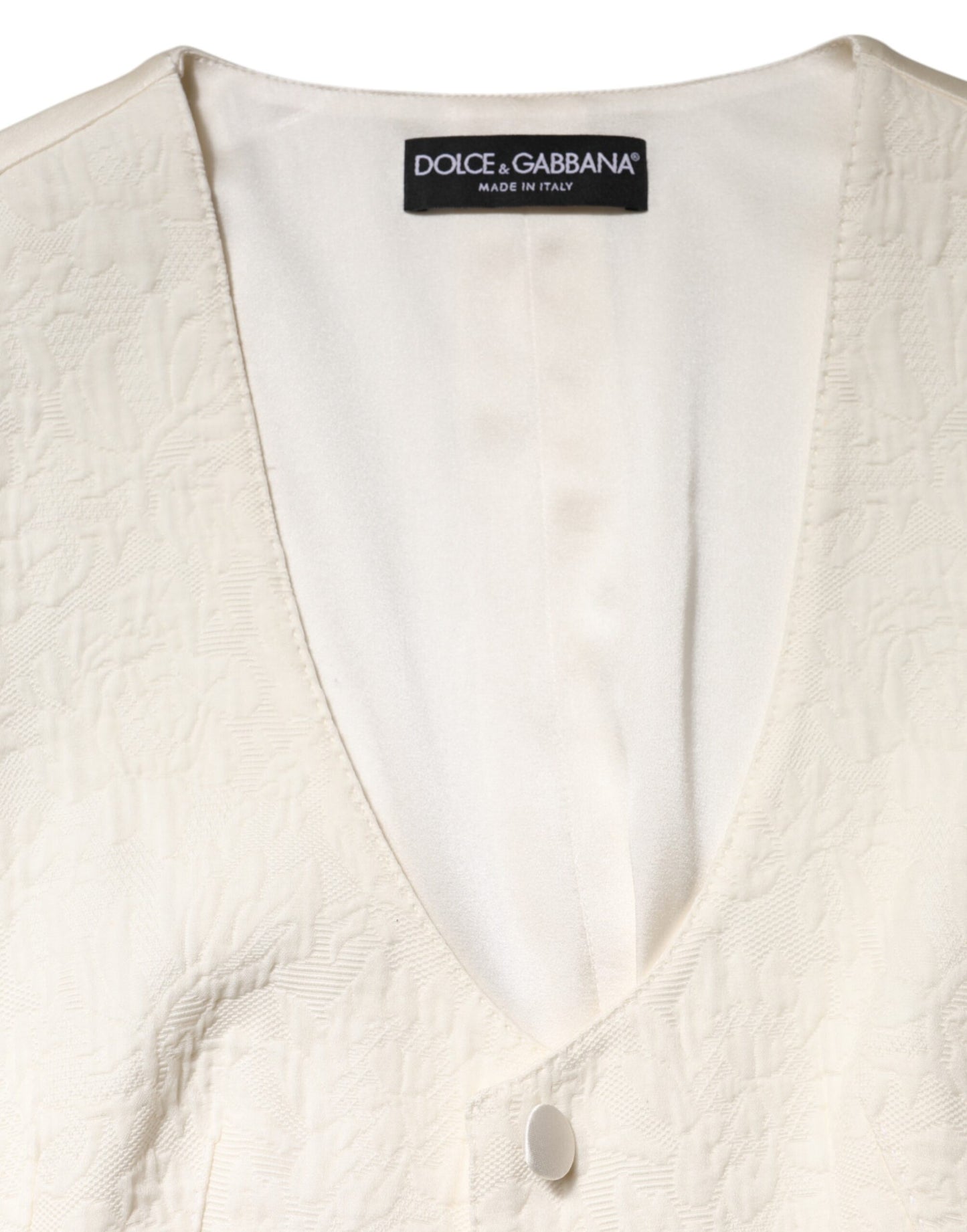 Dolce & Gabbana – Ärmelloses Westentop aus Baumwolle mit Knopfleiste in Elfenbein
