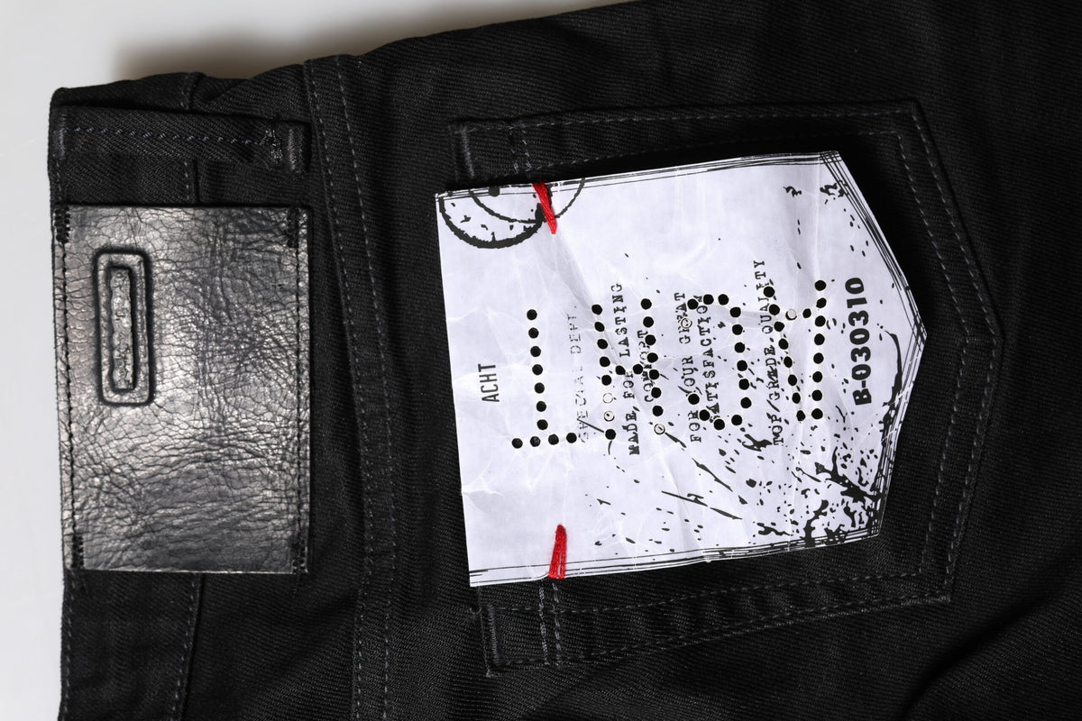 Acht – Schwarze Slim Fit-Jeans aus Baumwolle mit niedriger Taille