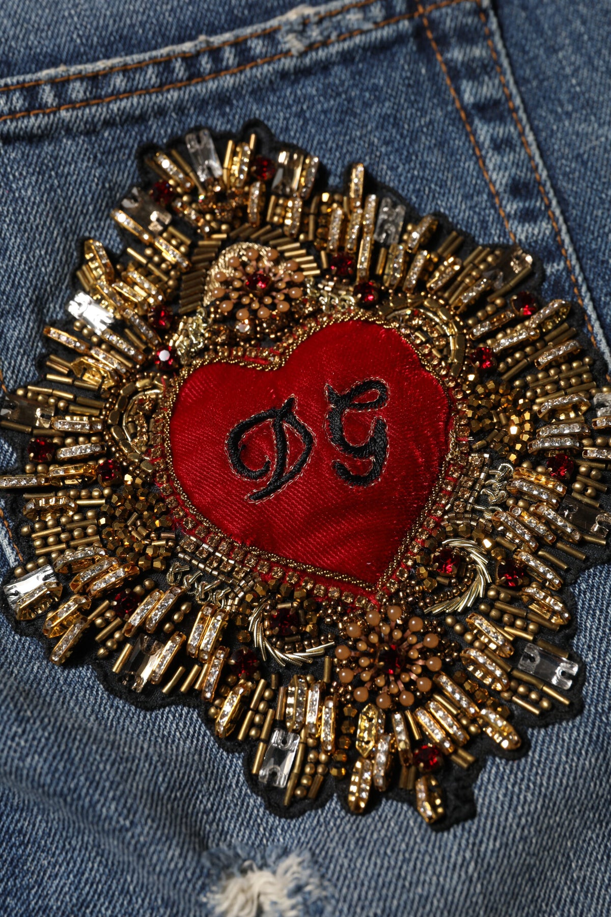 Dolce & Gabbana – Boyfriend-Jeans aus zerfetztem Baumwolldenim in Blau