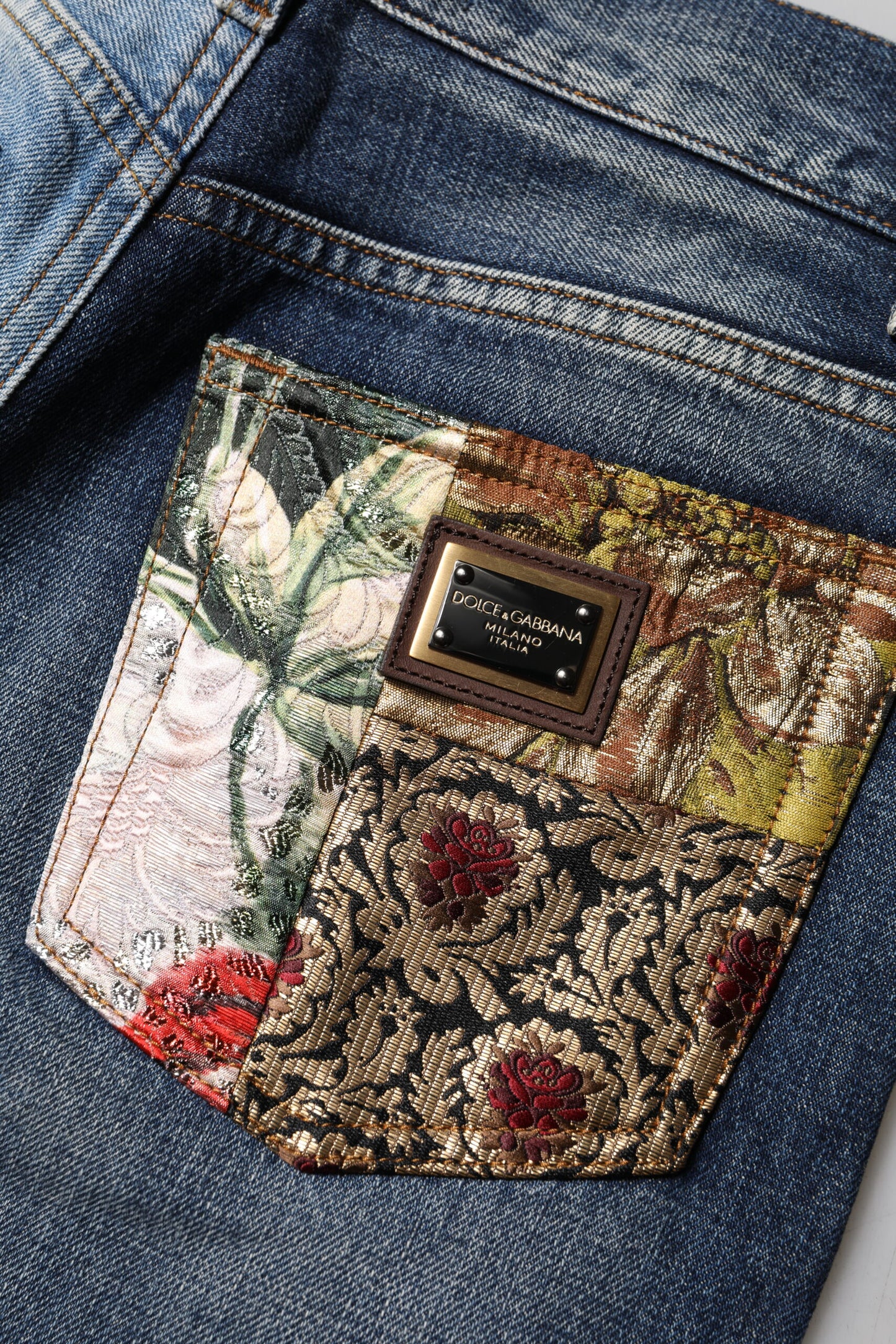 Dolce & Gabbana – Mehrfarbige Patchwork-Jeans aus konischem Denim