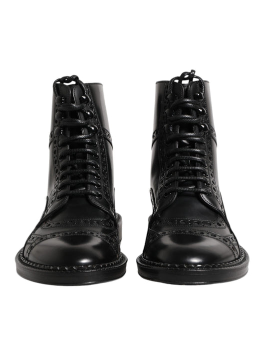 Dolce & Gabbana – Schwarze, wadenhohe Schnürstiefel aus Leder