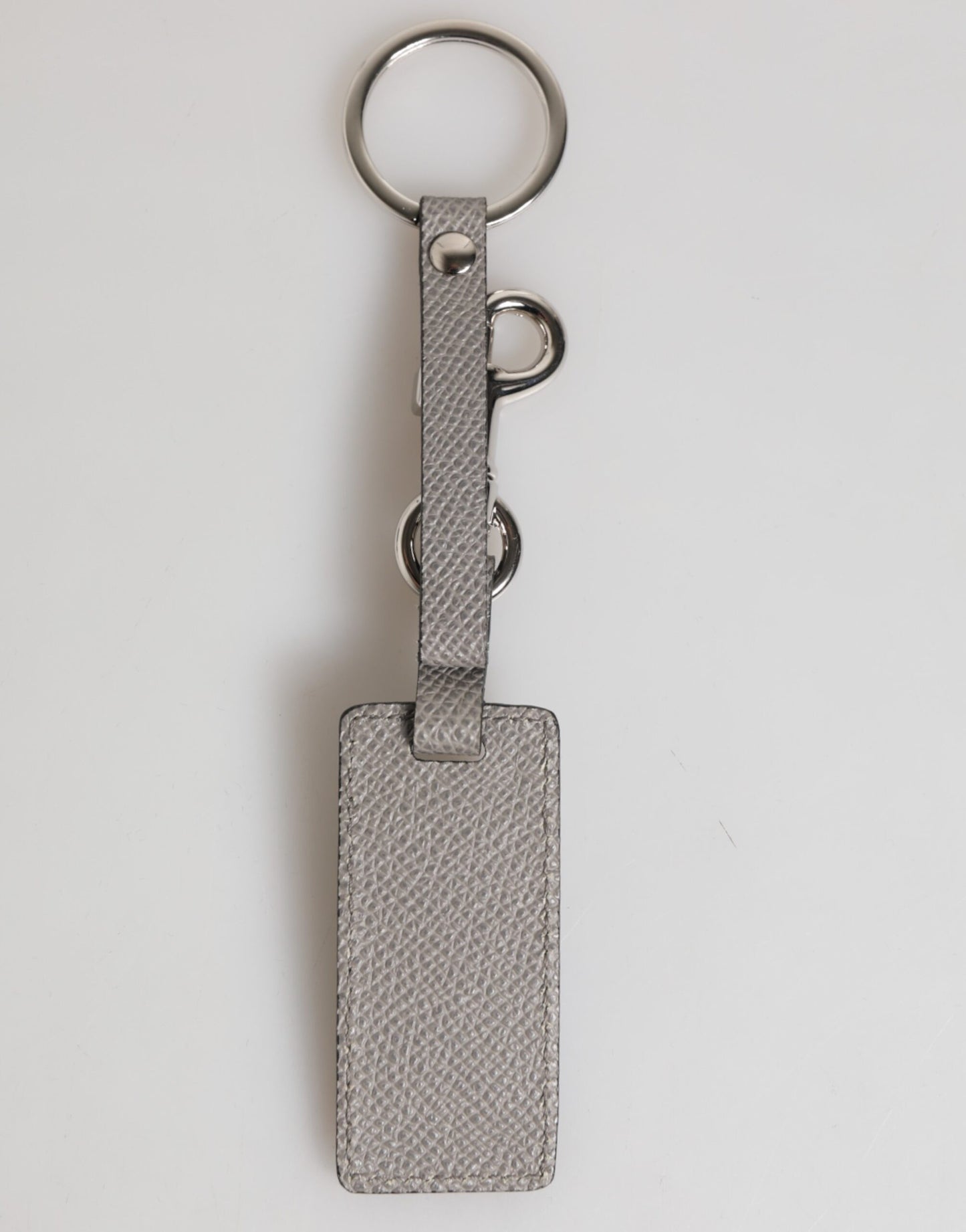Dolce & Gabbana Schlüsselanhänger aus grauem Leder mit Logo und Metallring für Herren