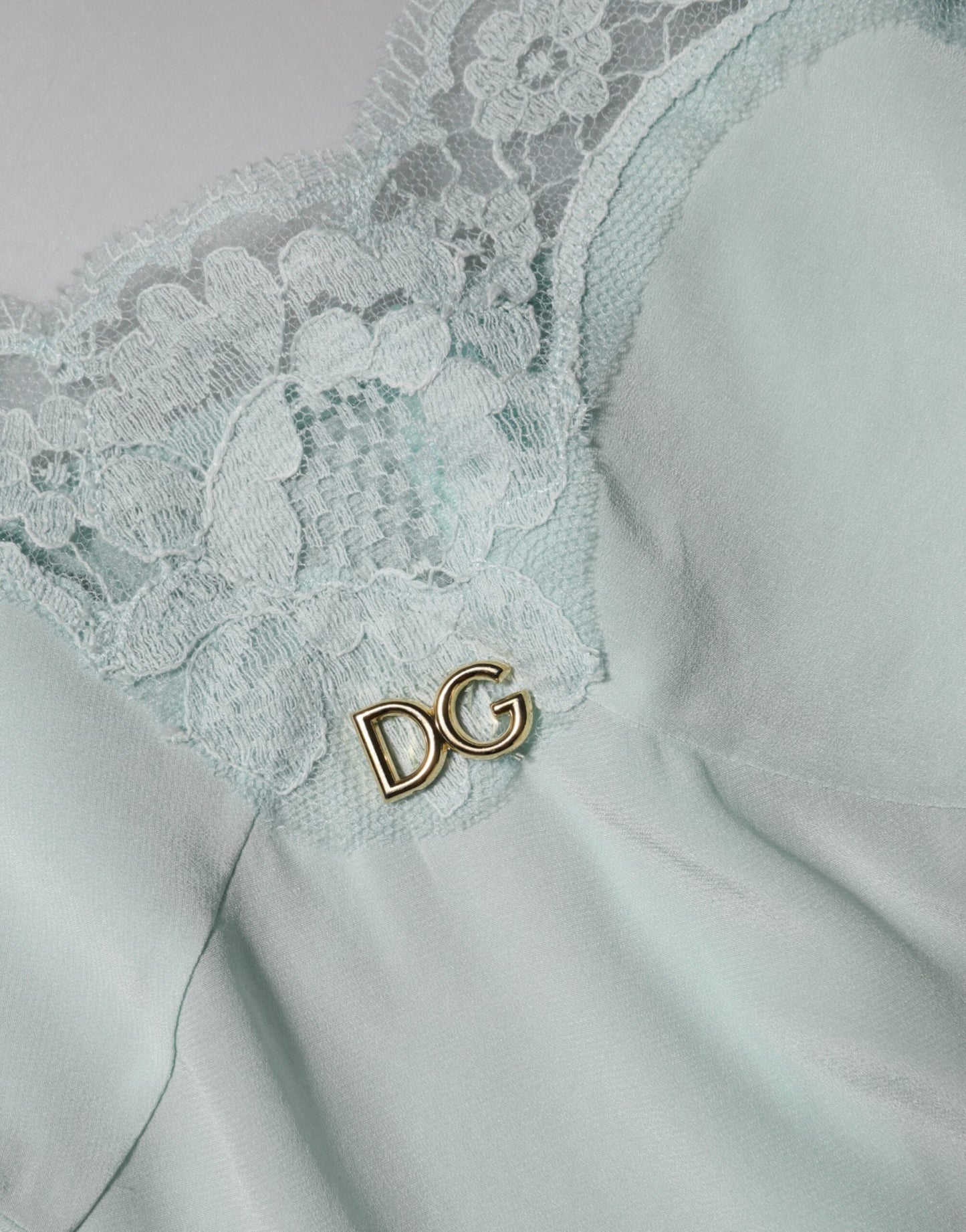 Dolce & Gabbana – Hellblaues, figurbetontes Midi-Slipkleid aus Seidenspitze