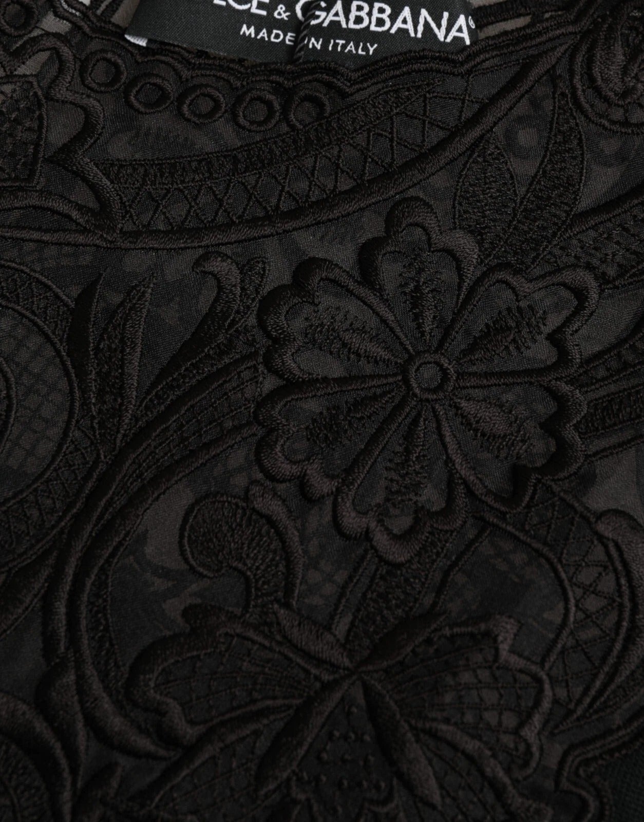 Dolce & Gabbana – Schwarze Bluse mit langen Ärmeln aus Seide und Spitzenbesatz