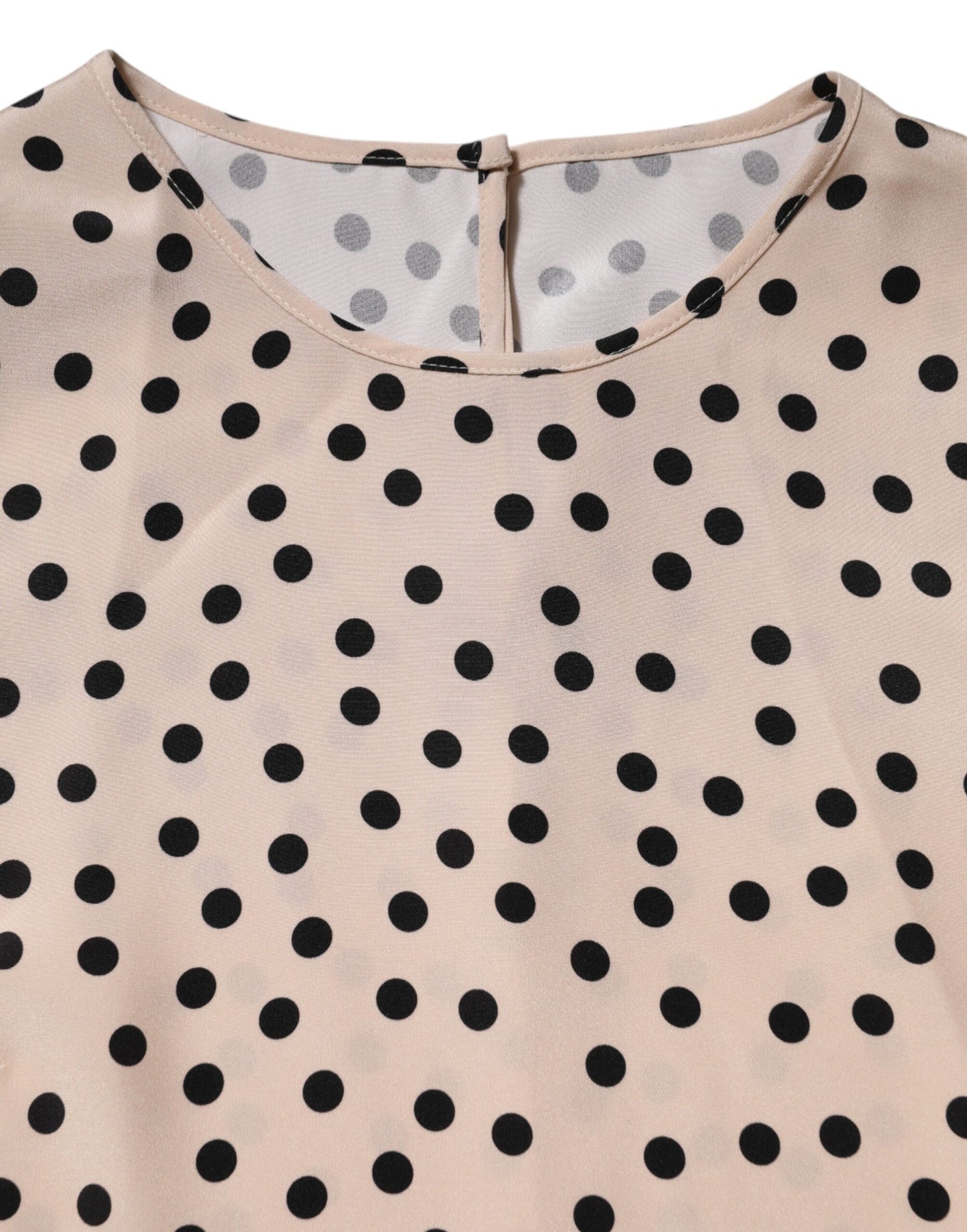 Dolce & Gabbana – Kurzärmliges Seidenblusenoberteil in Beige und Schwarz mit Punkten