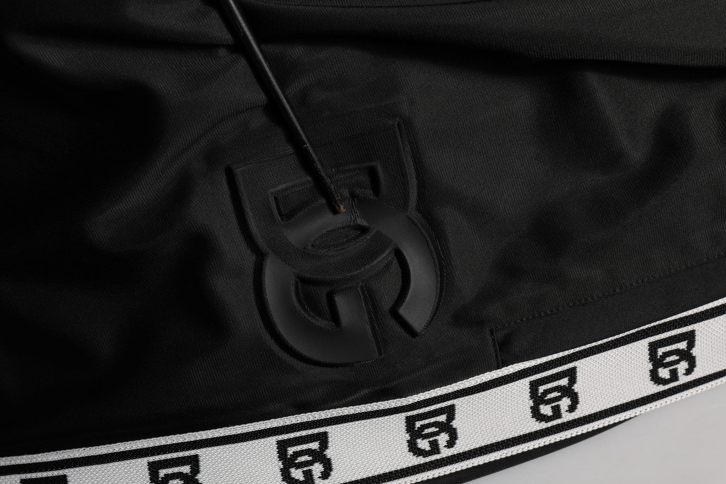 Dolce & Gabbana – Schwarze Jogginghose aus Polyester mit Logostreifen