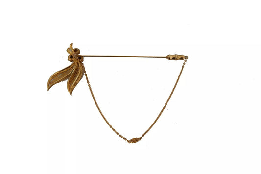 Dolce & Gabbana – Goldfarbene Brosche aus 925er Sterlingsilber mit Kristallkette