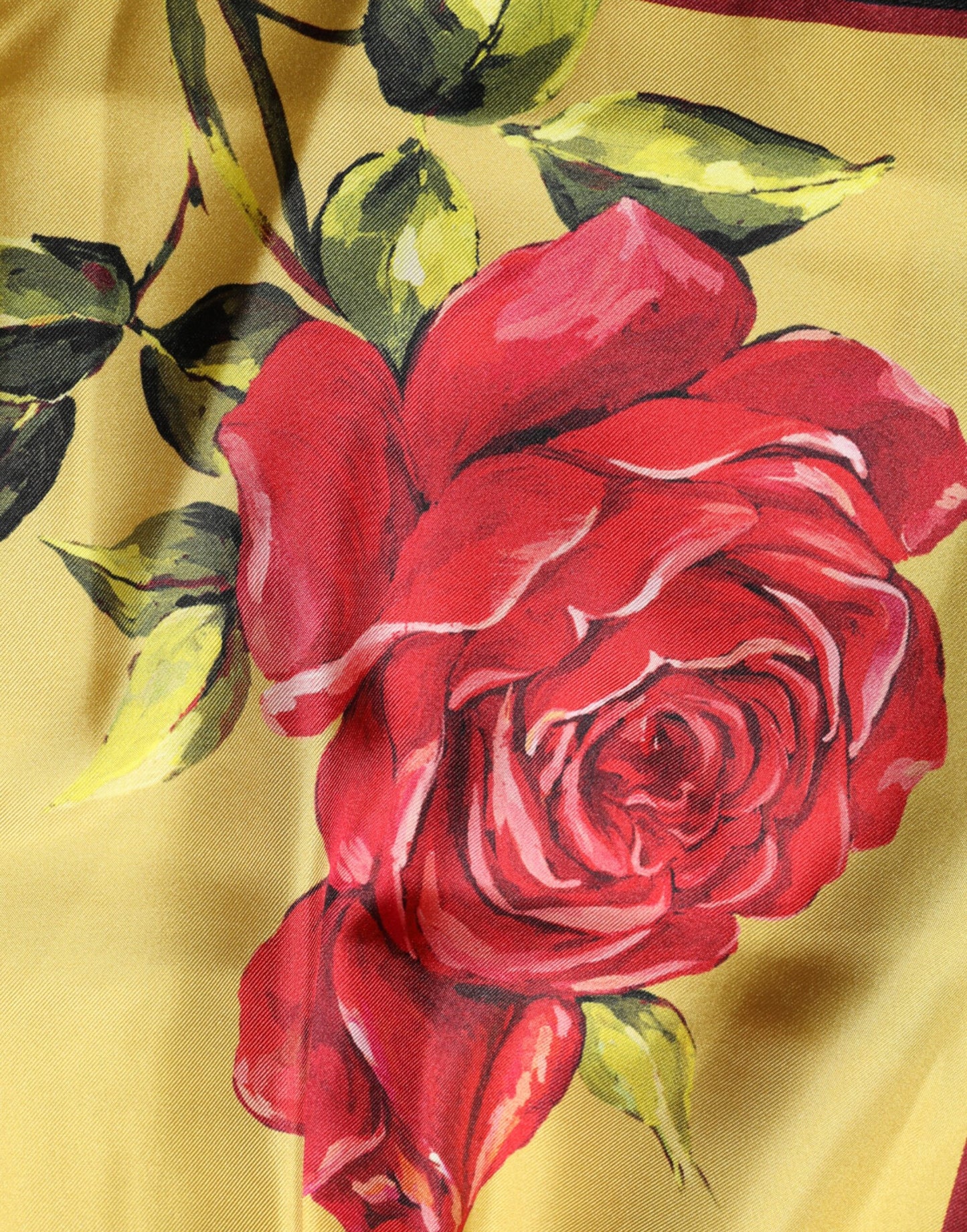 Dolce & Gabbana – Gelbe Bermudashorts aus Seide mit Blumendruck für Herren