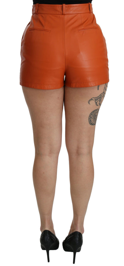 Dolce &amp; Gabbana – Orangefarbene Hotpants-Shorts aus Leder mit hoher Taille