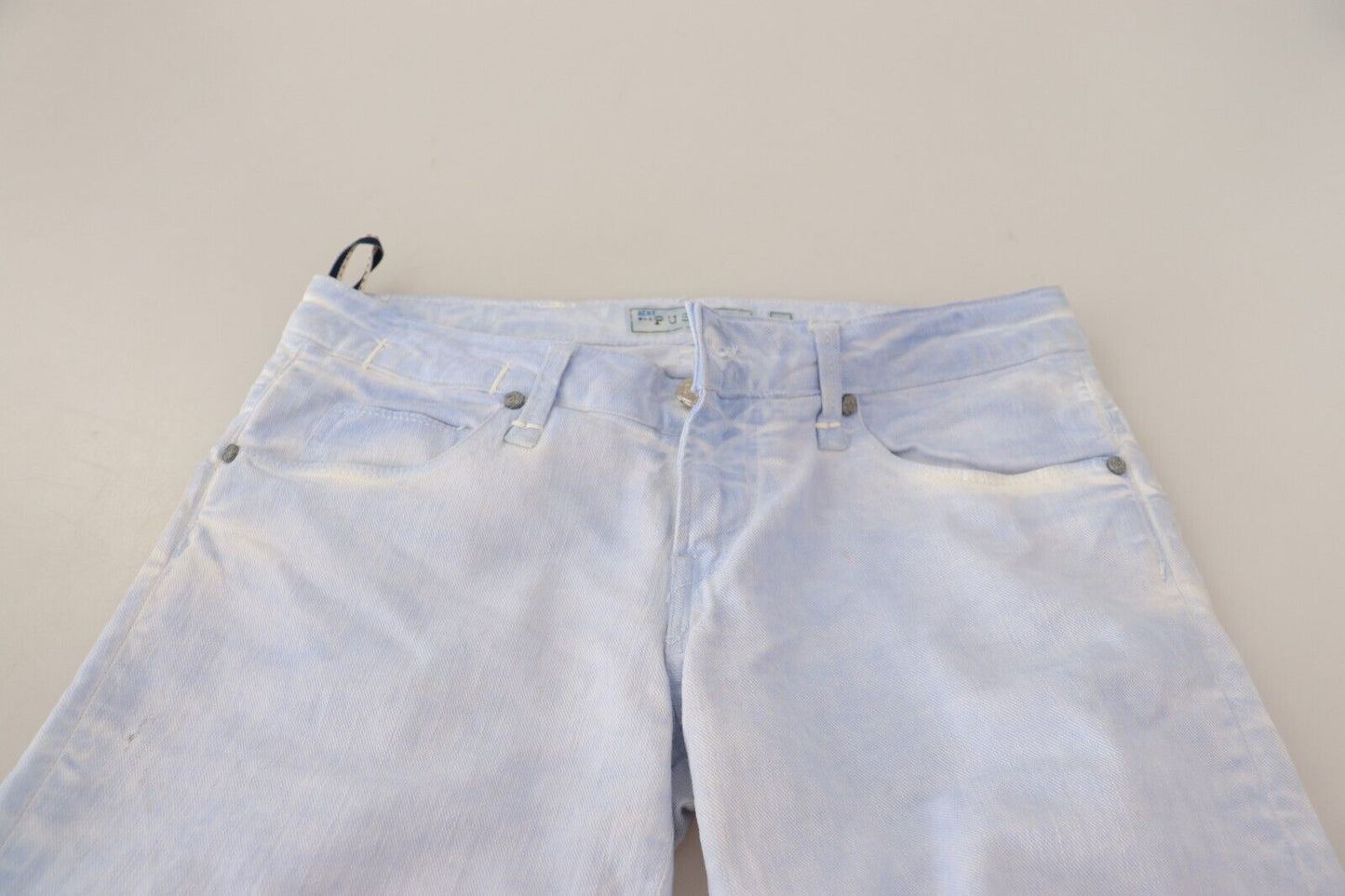 Acht Hellblaue Skinny Jeans aus Baumwolle mit umgeschlagenem Saum für Damen