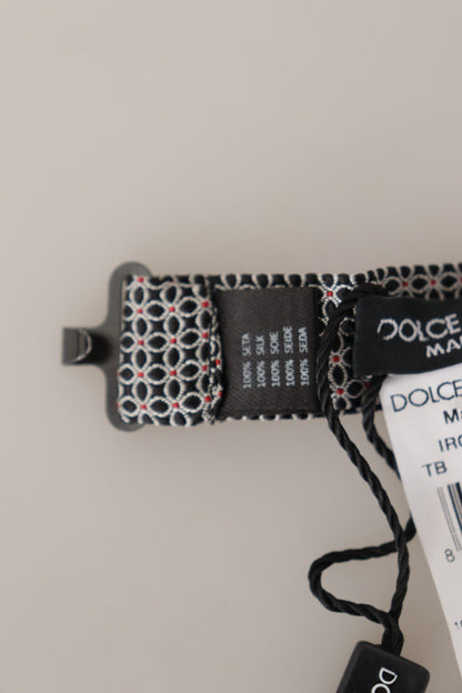 Dolce &amp; Gabbana – Schwarz-weiße Seidenkrawatte mit Blumenmuster und Papillon-Muster