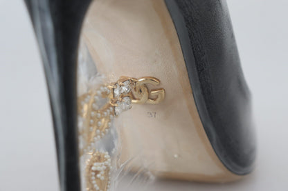 Dolce &amp; Gabbana Schwarze Pumps aus Leder mit Kunststoffummantelung