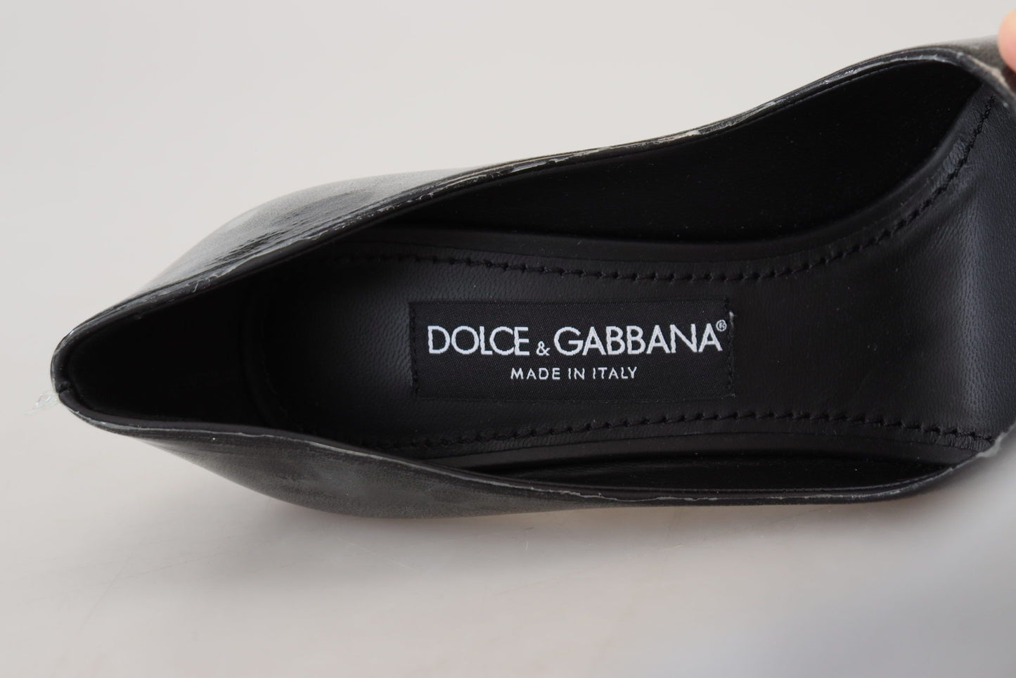 Dolce &amp; Gabbana Schwarze Pumps aus Leder mit Kunststoffummantelung