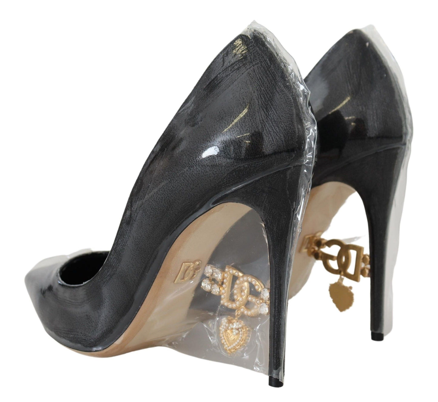 Dolce &amp; Gabbana Schwarze Pumps aus Leder mit Kunststoffummantelung