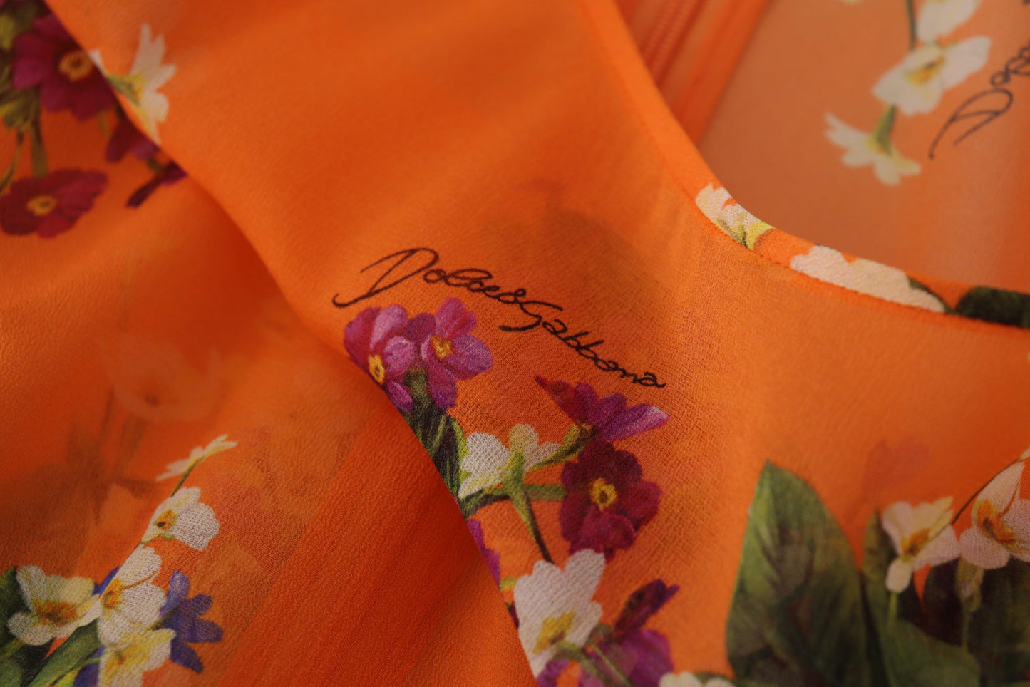 Dolce &amp; Gabbana – Orangefarbene Bluse mit Blumenmuster und langen Ärmeln