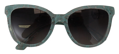 Dolce &amp; Gabbana – Runde Sonnenbrille DG4190 aus Acetat mit blauer Spitze und Kristallen