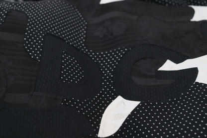 Dolce &amp; Gabbana – Schwarz-weiße Lammfelljacke mit durchgehendem Reißverschluss