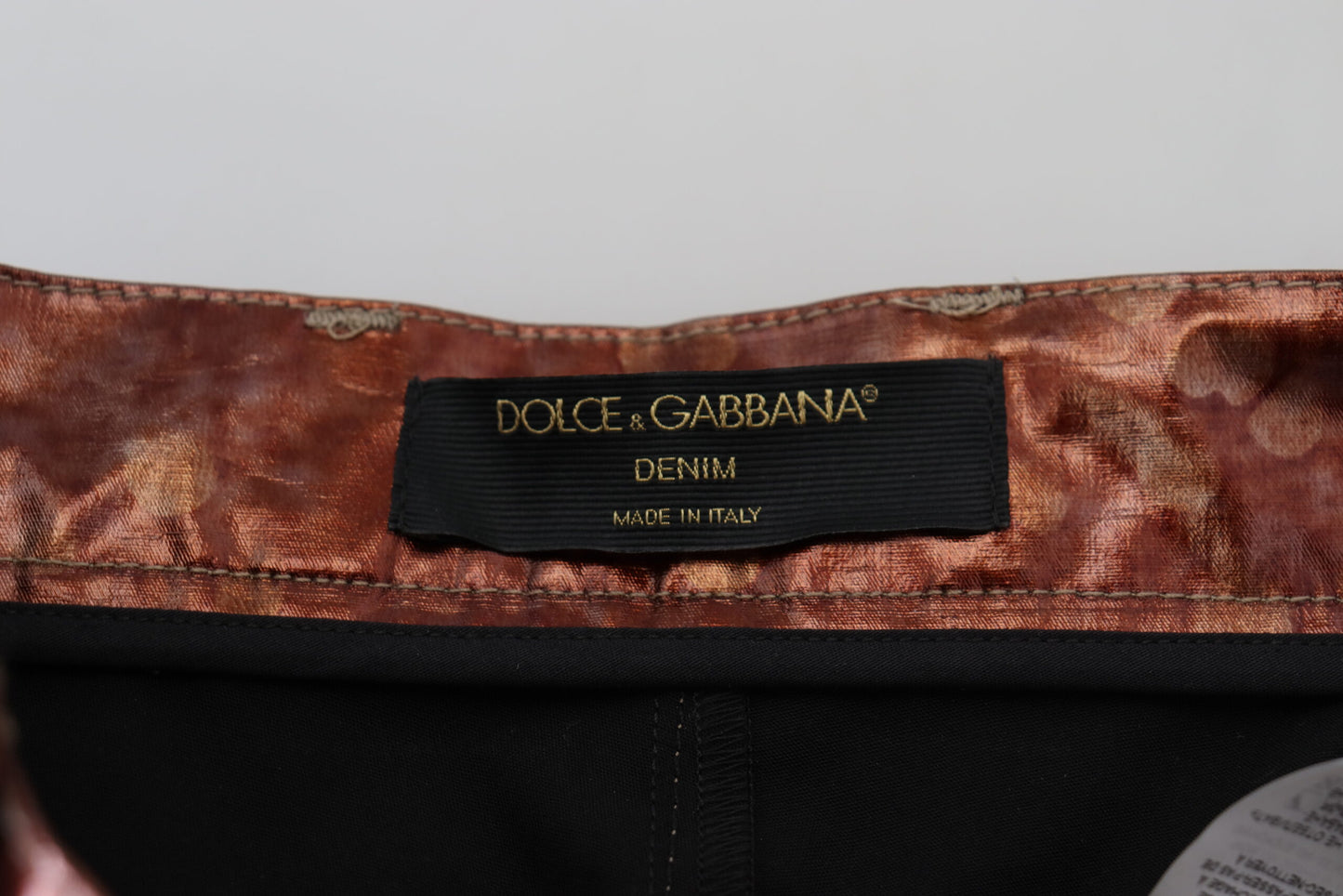 Dolce &amp; Gabbana – Enge Jeans mit hoher Taille in Metallic-Bronze
