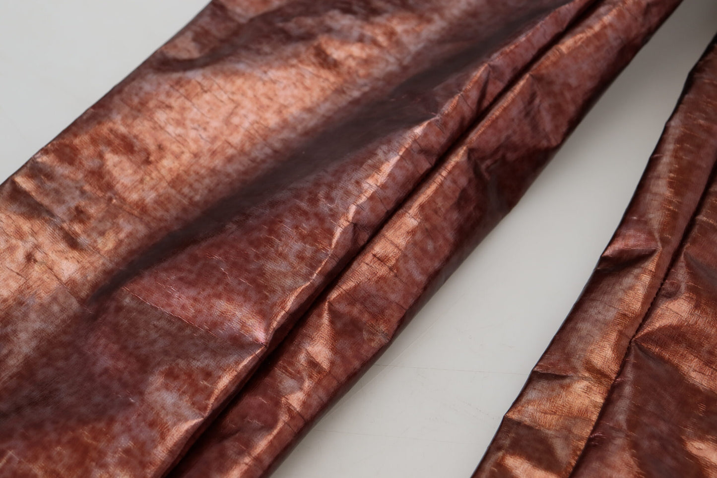 Dolce &amp; Gabbana – Enge Jeans mit hoher Taille in Metallic-Bronze