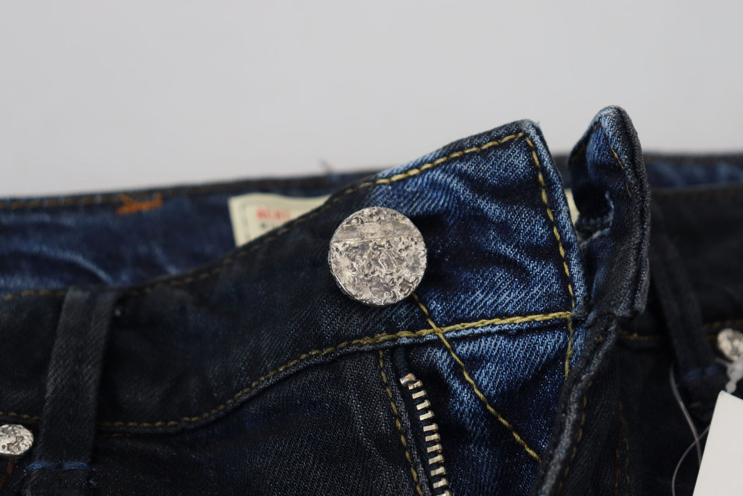 Acht Blaue, schmal geschnittene Damen-Jeans aus Baumwolle mit niedriger Taille