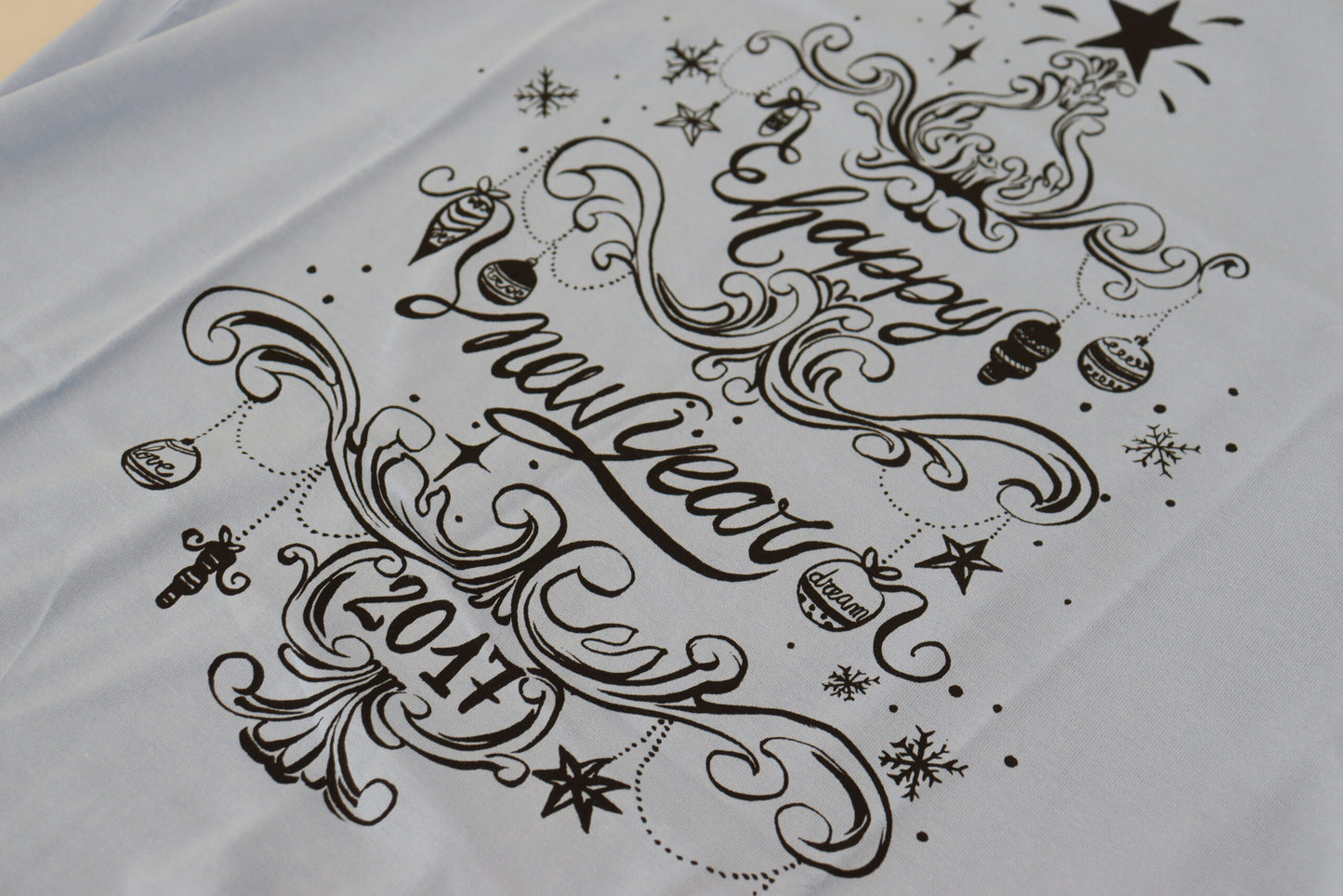 Dolce &amp; Gabbana Hellblaues Baumwoll-T-Shirt „Happy New Year 2017“