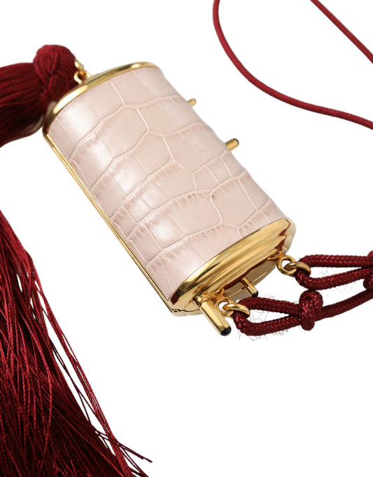 Dolce & Gabbana – Mini-Kosmetiktasche aus exotischem Leder mit Spiegel und Quaste in Rosa
