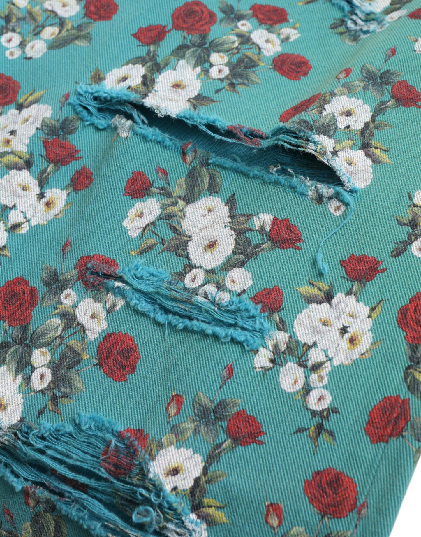 Dolce &amp; Gabbana – Enge Jeanshose aus Baumwolle mit Blumenmuster in Blau