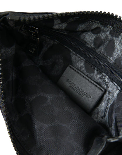 Dolce &amp; Gabbana – Schwarze Clutch mit Schlüsselanhänger und Logo-Plakette aus Nylon