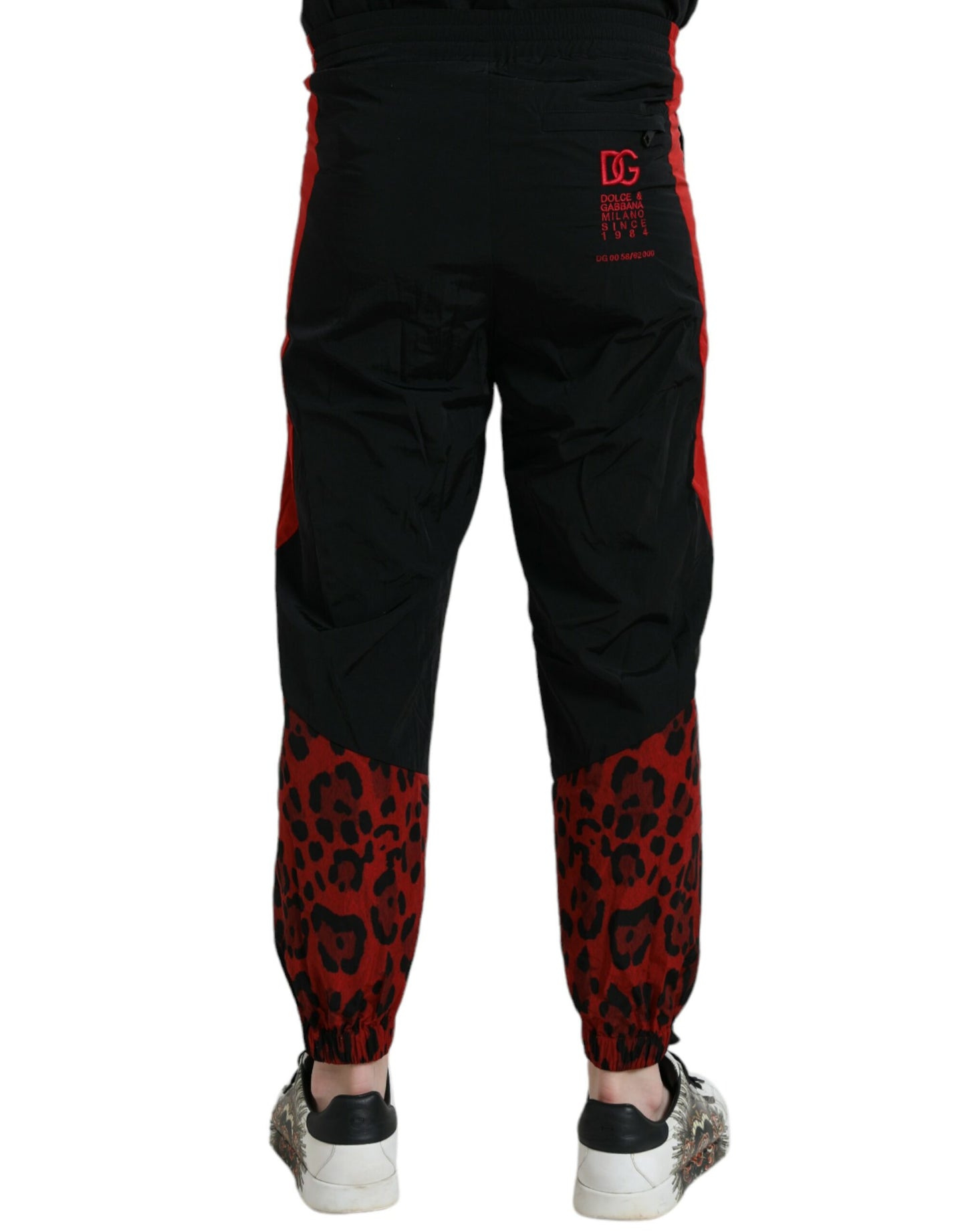 Dolce &amp; Gabbana – Jogginghose aus Nylon mit Leopardenmuster in Schwarz und Rot