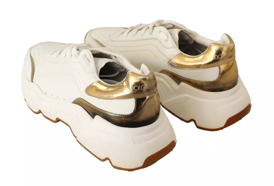 Dolce &amp; Gabbana – Sportliche Daymaster-Sneaker aus weißem Leder in Gold