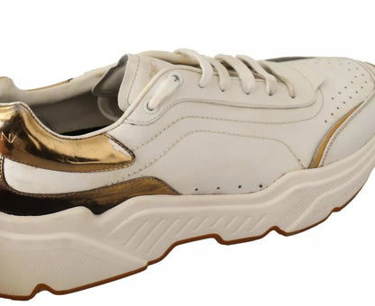 Dolce &amp; Gabbana – Sportliche Daymaster-Sneaker aus weißem Leder in Gold