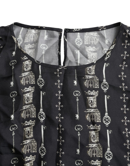 Dolce &amp; Gabbana – Schwarzes Seidenblusen-T-Shirt mit Schloss-Print