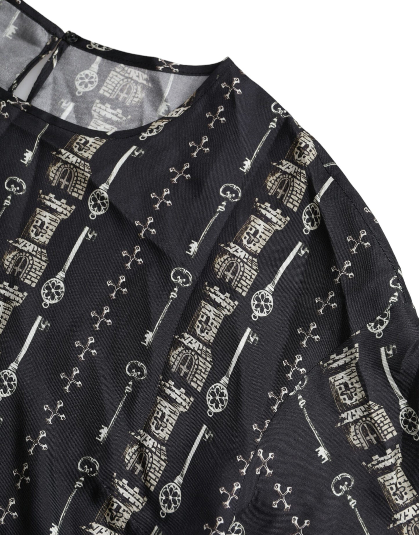 Dolce &amp; Gabbana – Schwarzes Seidenblusen-T-Shirt mit Schloss-Print