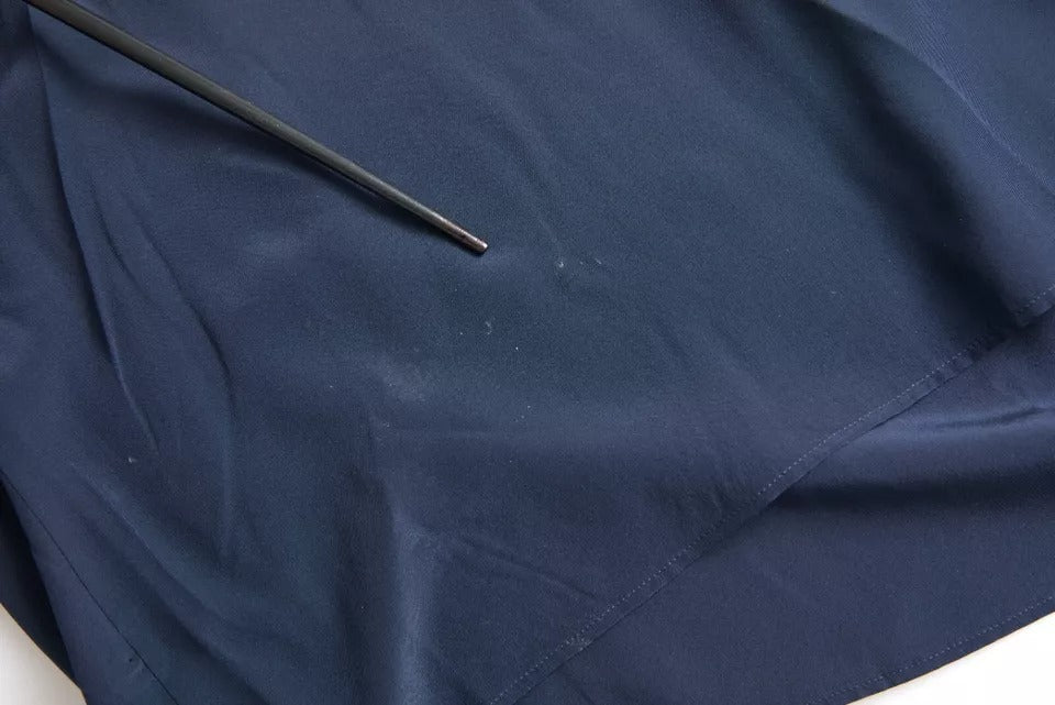 Dolce &amp; Gabbana – Blaues Blusenoberteil mit langen Ärmeln und Ascot-Kragen