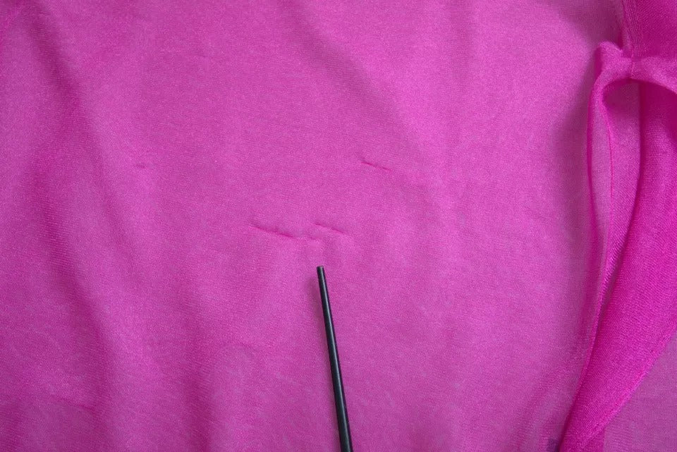 Dolce &amp; Gabbana – Transparentes Oberteil mit Rundhalsausschnitt und langen Ärmeln in Rosa