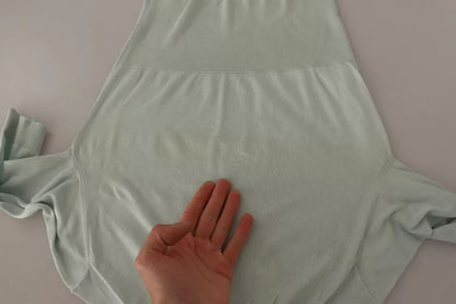 Dolce &amp; Gabbana – Seidentop mit Rollkragen und 3/4-Ärmeln in Mintgrün