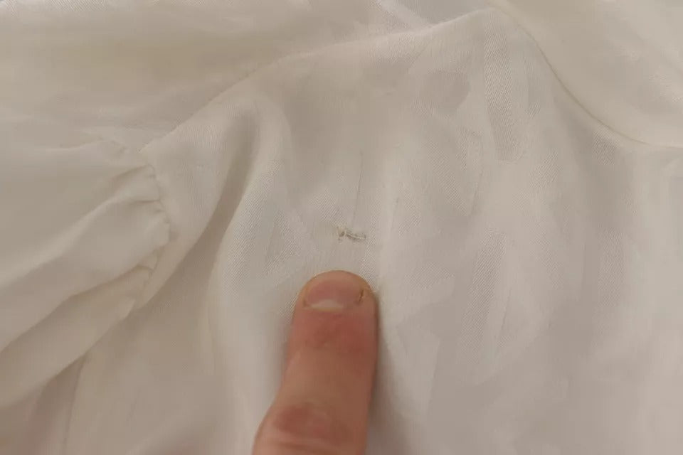 Dolce &amp; Gabbana – Blusentop aus Seide mit Ascot-Kragen in Weiß mit Muster