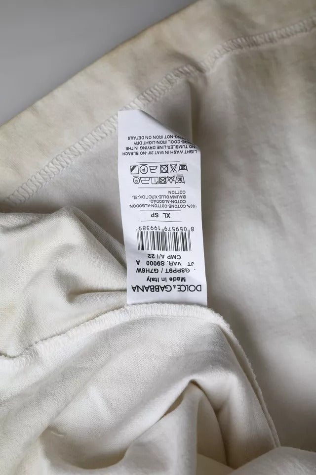 Dolce &amp; Gabbana – T-Shirt aus Baumwolle mit Rundhalsausschnitt und Logo in Off-White