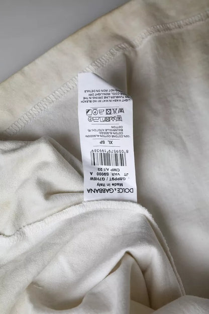 Dolce &amp; Gabbana – T-Shirt aus Baumwolle mit Rundhalsausschnitt und Logo in Off-White